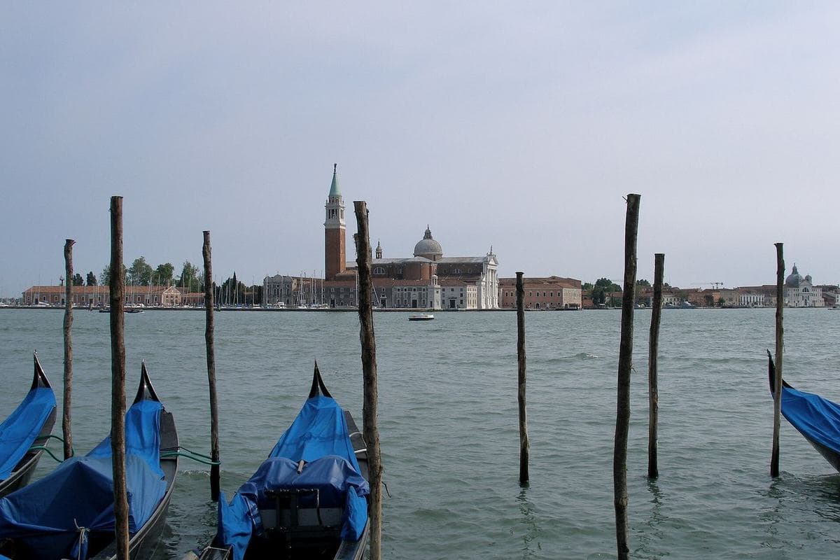 Gondolas moored off the waterfront with San Giorgio Maggiore behind